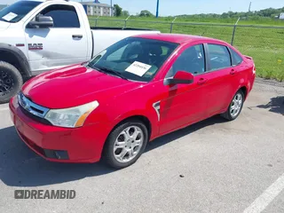 2008 Ford Focus SE with VIN 1FAHP35N98W125632, listed as a IAAI auction lot 42204436 with 232,509 mi miles and . Bid and sale history available at carsss.com. Image 2.
