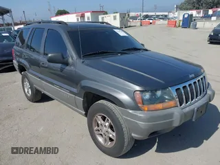 2002 Jeep Grand Cherokee Laredo z VIN 1J4GX48S42C170624, wystawiony jako IAAI lot #42548309 z przebiegiem 144 600 mil mil oraz . Historia ofert i sprzedaży dostępna na DreamBid. Obrazek 1.