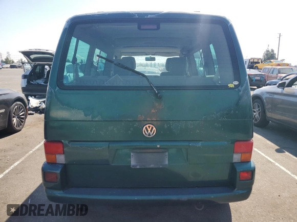 2003 Volkswagen EuroVan с VIN WV2KB47043H001319, выставлен на аукционе Copart как лот 73758024 с пробегом 88 497 миль миль и Чистый • Clean title. История ставок и продаж доступна на DreamBid. Изображение 6.