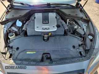 2015 Infiniti Q50 with VIN JN1BV7APXFM334409, listed as a Copart auction lot 63150875 with 125,803 mi miles and Salvage title. Bid and sale history available at DreamBid. Image 11.