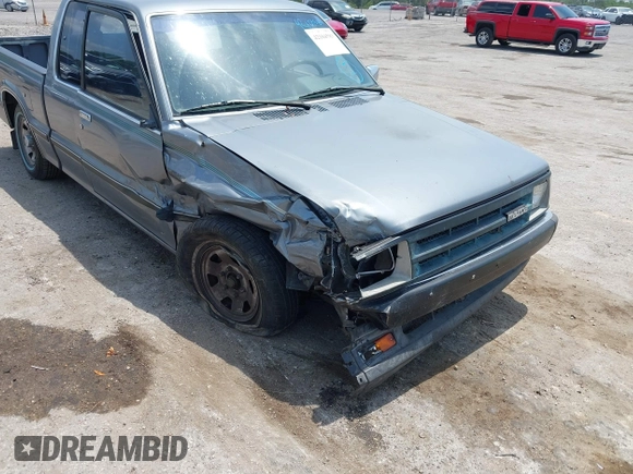 1992 Mazda B-Series Truck with VIN JM2UF313XN0306779, listed as a IAAI auction lot 42104583 with 137,826 mi miles and . Bid and sale history available at DreamBid. Image 6.