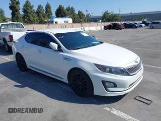2015 Kia Optima Hybrid with VIN KNAGM4AD0F5080307, listed as a IAAI auction lot 36993014 with 149,574 mi miles. Bid and sale history available at carsss.com. Image 1.
