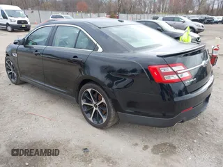 2016 Ford Taurus SEL z VIN 1FAHP2H80GG130887, wystawiony jako IAAI lot #41911575 z przebiegiem 138 469 mil mil oraz . Historia ofert i sprzedaży dostępna na DreamBid. Obrazek 3.
