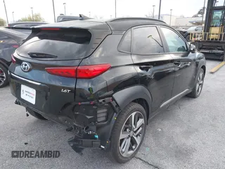 2021 Hyundai Kona Limited with VIN KM8K33A5XMU677871, listed as a IAAI auction lot 41593228 with 28,197 mi miles. Bid and sale history available at carsss.com. Image 4.