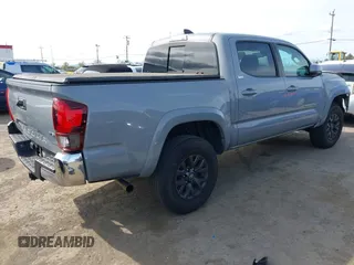 2020 Toyota Tacoma SR5 with VIN 5TFAZ5CN6LX089275, listed as a IAAI auction lot 41987526 with 51,661 mi miles and . Bid and sale history available at DreamBid. Image 4.