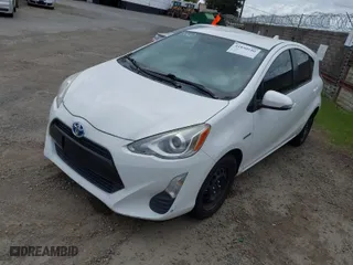 2016 Toyota Prius c One with VIN JTDKDTB34G1121639, listed as a IAAI auction lot 41890180 with 141,080 mi miles. Bid and sale history available at carsss.com. Image 2.
