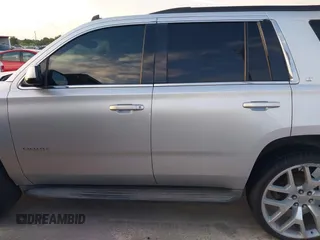2015 Chevrolet Tahoe LT with VIN 1GNSCBKC2FR232095, listed as a IAAI auction lot 42718627 with 174,130 mi miles and . Bid and sale history available at DreamBid. Image 14.