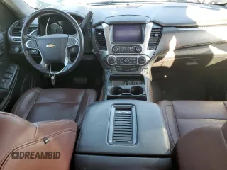 2019 Chevrolet Suburban Premier with VIN 1GNSKJKJXKR323704, listed as a Copart auction lot 72757214 with 150,404 mi miles and Salvage Title. Bid and sale history available at DreamBid. Image 8.