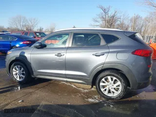 2019 Hyundai Tucson Value with VIN KM8J33A49KU860842, listed as a IAAI auction lot 41735224 with 57,197 mi miles. Bid and sale history available at carsss.com. Image 14.