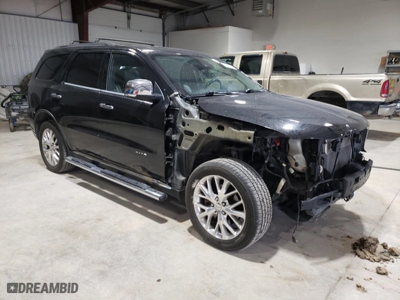 2014 Dodge Durango Citadel with VIN 1C4RDJEG8EC563357, listed as a Copart auction lot 52500965 with 120,769 mi miles and Salvage Title. Bid and sale history available at carsss.com. Image 4.