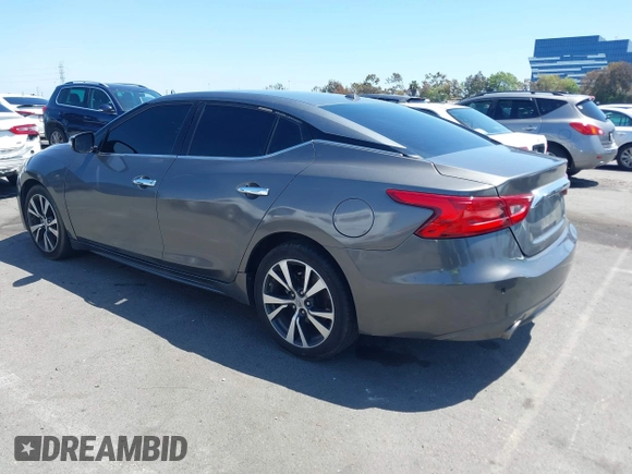 2018 Nissan Maxima Platinum z VIN 1N4AA6AP1JC388815, wystawiony jako IAAI lot #42098902 z przebiegiem 80 677 mil mil oraz . Historia ofert i sprzedaży dostępna na DreamBid. Obrazek 3.