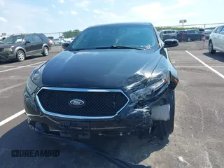 2013 Ford Taurus SHO z VIN 1FAHP2KT1DG135962, wystawiony jako IAAI lot #42449604 z przebiegiem 138 921 mil mil oraz . Historia ofert i sprzedaży dostępna na DreamBid. Obrazek 12.