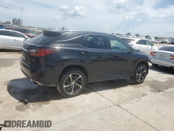 2016 Lexus RX 350 with VIN 2T2ZZMCA7GC012103, listed as a Copart auction lot 62763585 with 297,427 mi miles and Salvage title. Bid and sale history available at DreamBid. Image 3.