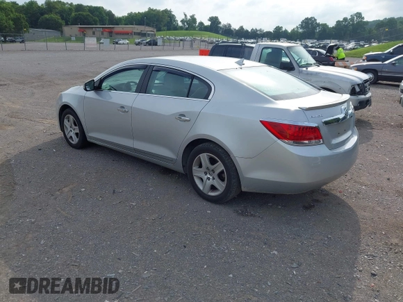 2011 Buick LaCrosse CX z VIN 1G4GA5EC6BF257283, wystawiony jako IAAI lot #42522899 z przebiegiem 172 284 mil mil oraz . Historia ofert i sprzedaży dostępna na DreamBid. Obrazek 3.