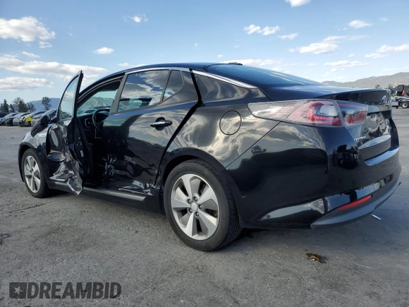 2015 Kia Optima Hybrid EX with VIN KNAGN4ADXF5083079, listed as a Copart auction lot 50986815 with 100,420 mi miles and Salvage Title. Bid and sale history available at carsss.com. Image 2.