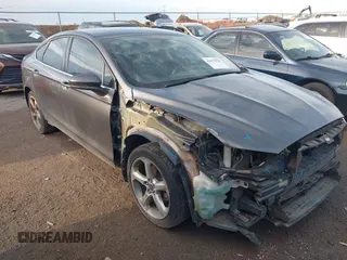 2016 Ford Fusion S z VIN 3FA6P0G74GR114141, wystawiony jako IAAI lot #41672918 z przebiegiem 167 168 mil mil oraz . Historia ofert i sprzedaży dostępna na DreamBid. Obrazek 1.