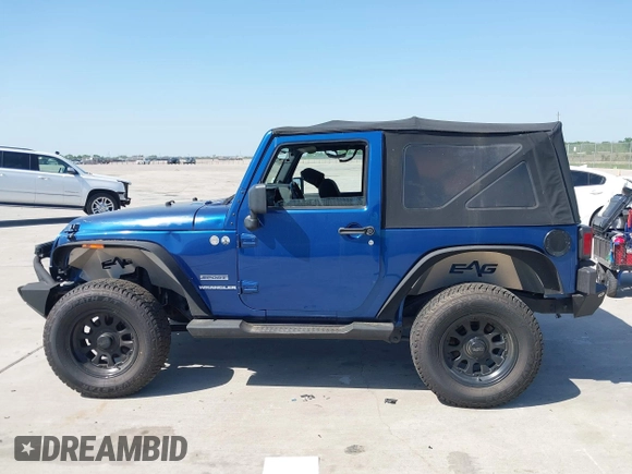 2010 Jeep Wrangler Sport with VIN 1J4AA2D11AL117404, listed as a IAAI auction lot 42012340 with 266,310 mi miles and . Bid and sale history available at carsss.com. Image 14.