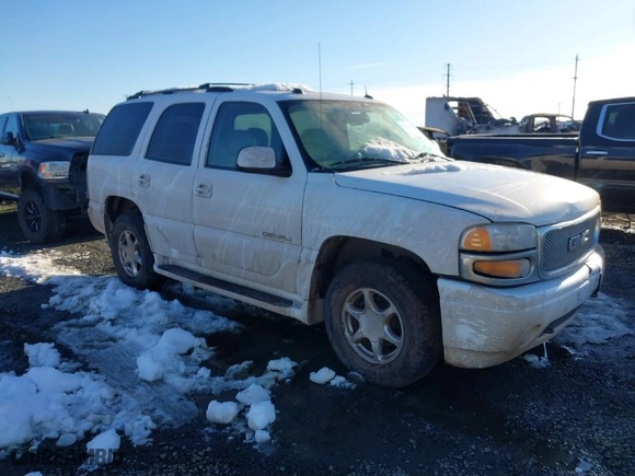 2005 GMC Yukon Denali with VIN 1GKEK63U45J175021, listed as a IAAI auction lot 41565852 with 112,203 mi miles. Bid and sale history available at carsss.com. Image 1.