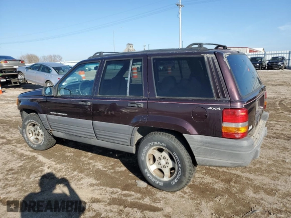 1997 Jeep Grand Cherokee Laredo with VIN 1J4GZ58S9VC687969, listed as a Copart auction lot 79930814 with 0 mi miles and Salvage Title. Bid and sale history available at carsss.com. Image 2.