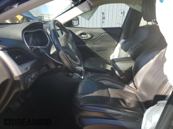 2014 Jeep Cherokee Trailhawk with VIN 1C4PJMBS1EW161642, listed as a Copart auction lot 46672345 with 196,908 mi miles and Salvage Title. Bid and sale history available at carsss.com. Image 7.