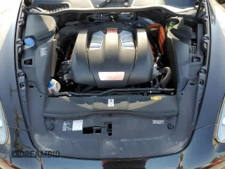 2012 Porsche Cayenne S Hybrid z VIN WP1AE2A21CLA92318, wystawiony jako Copart lot #55595055 z przebiegiem 82 184 mil mil oraz Szkody całkowita. Historia ofert i sprzedaży dostępna na DreamBid. Obrazek 12.