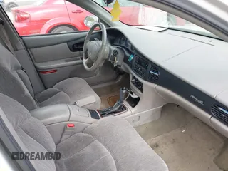 2001 Buick Regal LS z VIN 2G4WB52KX11247852, wystawiony jako IAAI lot #42219941 z przebiegiem Nie podano mil oraz . Historia ofert i sprzedaży dostępna na DreamBid. Obrazek 5.