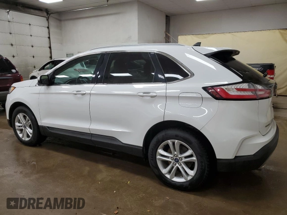 2020 Ford Edge SEL z VIN 2FMPK4J90LBB13748, wystawiony jako Copart lot #65687415 z przebiegiem 108 629 mil mil oraz Czysty tytuł • Clean title. Historia ofert i sprzedaży dostępna na DreamBid. Obrazek 2.