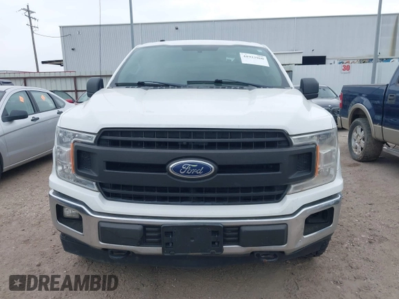 2018 Ford F-150 XL with VIN 1FTFW1E58JKE22834, listed as a IAAI auction lot 41923960 with 214,459 mi miles. Bid and sale history available at carsss.com. Image 13.