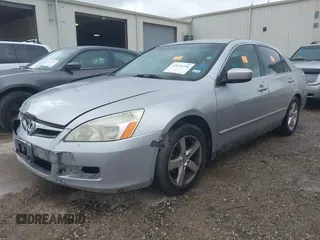 2007 Honda Accord LX with VIN JHMCM564X7C021650, listed as a IAAI auction lot 42576746 with 261,206 mi miles and . Bid and sale history available at DreamBid. Image 2.