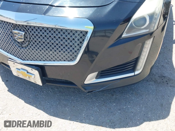 2014 Cadillac CTS Luxury RWD with VIN 1G6AR5SX4E0195791, listed as a IAAI auction lot 42004960 with Not Provided miles. Bid and sale history available at carsss.com. Image 6.
