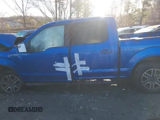 2015 Ford F-150 XL with VIN 1FTEW1CF4FFB55487, listed as a IAAI auction lot 41867754 with 213,454 mi miles. Bid and sale history available at carsss.com. Image 15.