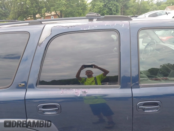 2005 Chevrolet Tahoe LT with VIN 1GNEK13T15J169979, listed as a IAAI auction lot 42718037 with 241,404 mi miles and . Bid and sale history available at DreamBid. Image 14.