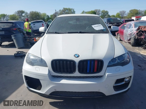 2014 BMW X6 xDrive35i z VIN 5UXFG2C5XE0C44062, wystawiony jako IAAI lot #41848304 z przebiegiem 154 683 mil mil oraz . Historia ofert i sprzedaży dostępna na DreamBid. Obrazek 13.