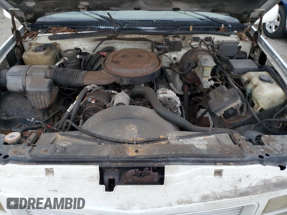 1995 GMC Suburban z VIN 1GKFK16K3SJ704911, wystawiony jako Copart lot #88326825 z przebiegiem 191 006 mil mil oraz Szkoda całkowita • Salvage title. Historia ofert i sprzedaży dostępna na DreamBid. Obrazek 12.