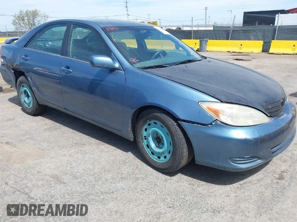 2004 Toyota Camry LE with VIN 4T1BE32K14U793314, listed as a IAAI auction lot 42031924 with 169,164 mi miles. Bid and sale history available at carsss.com. Image 1.