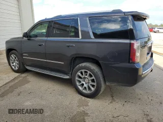 2018 GMC Yukon Denali with VIN 1GKS1CKJ4JR244135, listed as a Copart auction lot 71445964 with 148,375 mi miles and Salvage Title. Bid and sale history available at carsss.com. Image 2.