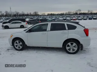 2011 Dodge Caliber Mainstreet with VIN 1B3CB3HAXBD237906, listed as a IAAI auction lot 41589696 with 135,909 mi miles and . Bid and sale history available at DreamBid. Image 14.