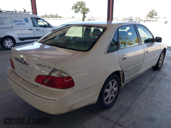 2003 Toyota Avalon XL z VIN 4T1BF28B03U307816, wystawiony jako IAAI lot #42313586 z przebiegiem 199 393 mil mil oraz . Historia ofert i sprzedaży dostępna na DreamBid. Obrazek 4.