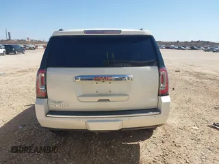 2015 GMC Yukon Denali with VIN 1GKS2CKJ3FR568729, listed as a IAAI auction lot 41741987 with 154,729 mi miles. Bid and sale history available at carsss.com. Image 16.