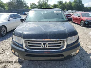 2013 Honda Ridgeline RTL with VIN 5FPYK1F58DB018136, listed as a Copart auction lot 61720925 with 184,020 mi miles and Salvage title. Bid and sale history available at DreamBid. Image 5.