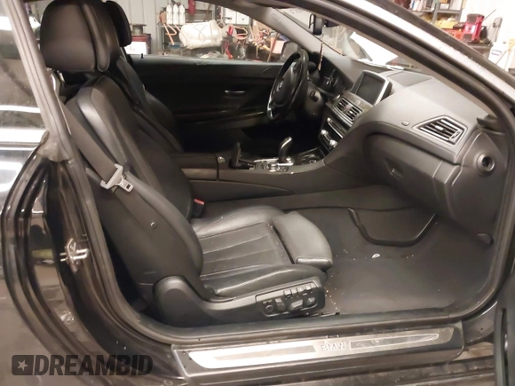2012 BMW 6 Series 650i xDrive with VIN WBALX5C57CC894205, listed as a IAAI auction lot 41591874 with 110,932 mi miles. Bid and sale history available at carsss.com. Image 5.