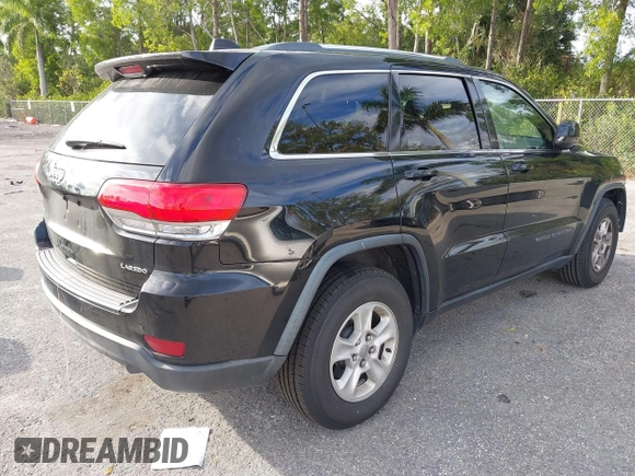 2017 Jeep Grand Cherokee Laredo with VIN 1C4RJEAG5HC663930, listed as a IAAI auction lot 41684918 with 91,063 mi miles. Bid and sale history available at carsss.com. Image 4.