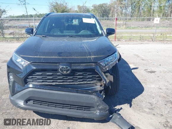 2021 Toyota RAV4 XLE with VIN 2T3W1RFV2MW107986, listed as a IAAI auction lot 41835348 with 103,450 mi miles. Bid and sale history available at carsss.com. Image 12.
