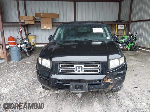 2007 Honda Ridgeline RTL with VIN 2HJYK16547H549241, listed as a IAAI auction lot 42282477 with 214,685 mi miles and . Bid and sale history available at DreamBid. Image 12.