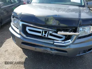 2009 Honda Ridgeline RTL with VIN 5FPYK16599B100707, listed as a IAAI auction lot 41877598 with 130,622 mi miles and . Bid and sale history available at DreamBid. Image 6.