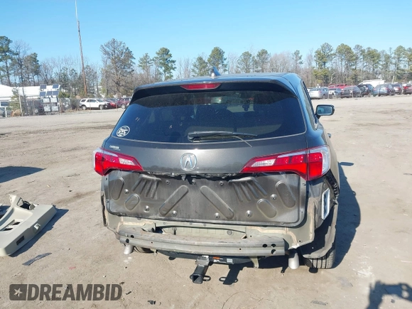 2016 Acura RDX with VIN 5J8TB4H36GL011656, listed as a IAAI auction lot 41421569 with 128,005 mi miles. Bid and sale history available at carsss.com. Image 17.