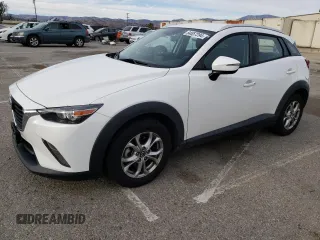 2016 Mazda CX-3 Touring with VIN JM1DKBC71G0123543, listed as a Copart auction lot 84657294 with 113,080 mi miles and Salvage Title. Bid and sale history available at carsss.com. Image 1.