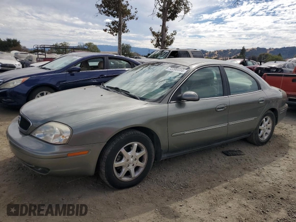 2001 Mercury Sable LS with VIN 1MEFM53U21G623749, listed as a Copart auction lot 72206684 with 97,044 mi miles and Salvage title. Bid and sale history available at DreamBid. Image 1.