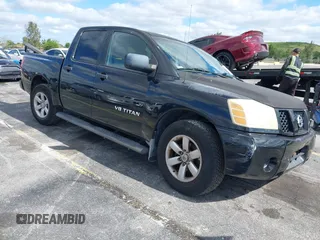 2005 Nissan Titan SE with VIN 1N6AA07A05N501283, listed as a IAAI auction lot 39151799 with 129,069 mi miles. Bid and sale history available at carsss.com. Image 1.