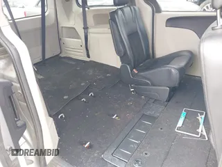 2017 Dodge Grand Caravan SXT with VIN 2C4RDGCG6HR671199, listed as a IAAI auction lot 42031157 with 99,189 mi miles and . Bid and sale history available at DreamBid. Image 8.